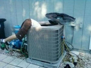 man doing air conditioning repair philadelphia pa.
