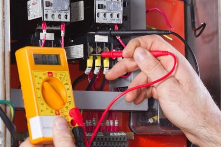 picture of electrician doing electrical testing 