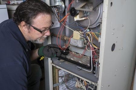 picture man inspection of heater